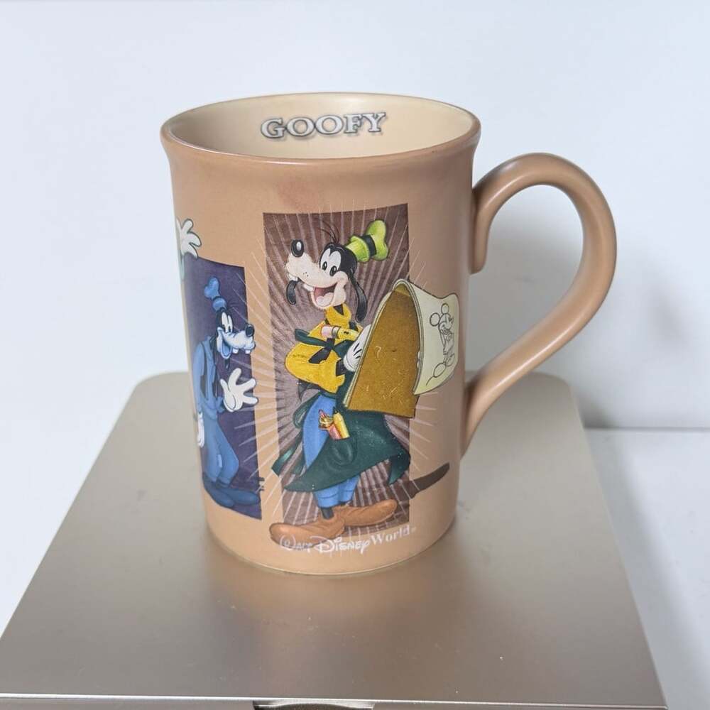 Walt Disney World Evolution Of Goofy Tan Coffee Mug
